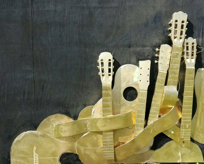 golden forest of guitars